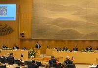 Speakers to the conference seated on podium © Sveriges Riksdag 